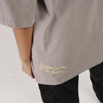 Camiseta Oversized Furia Harder To Kill Cinza
